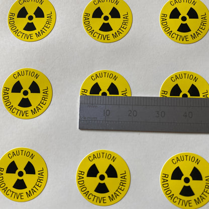 Radioactive material caution - warning label - 20mm diameter - Pack of 240