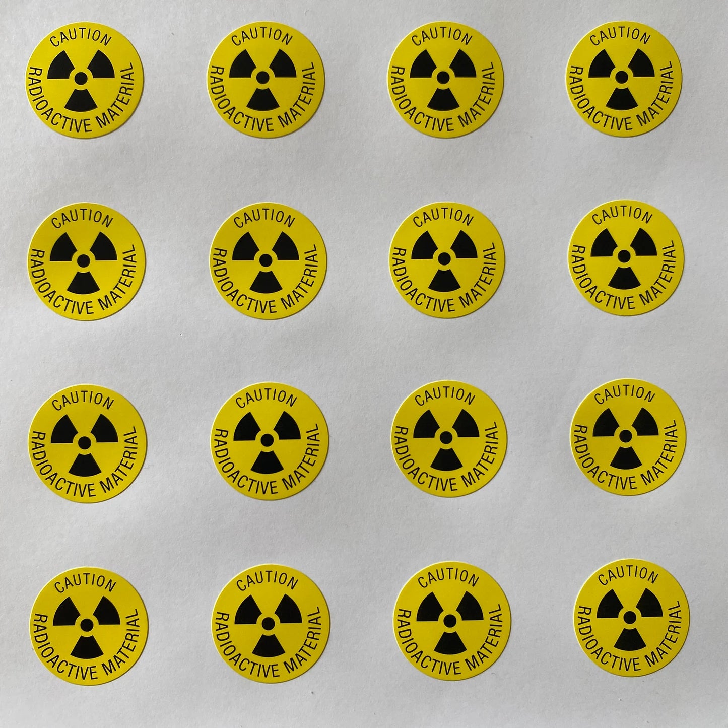Radioactive material caution - warning label - 20mm diameter - Pack of 240