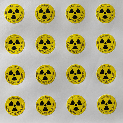 Radioactive material caution - warning label - 20mm diameter - Pack of 240